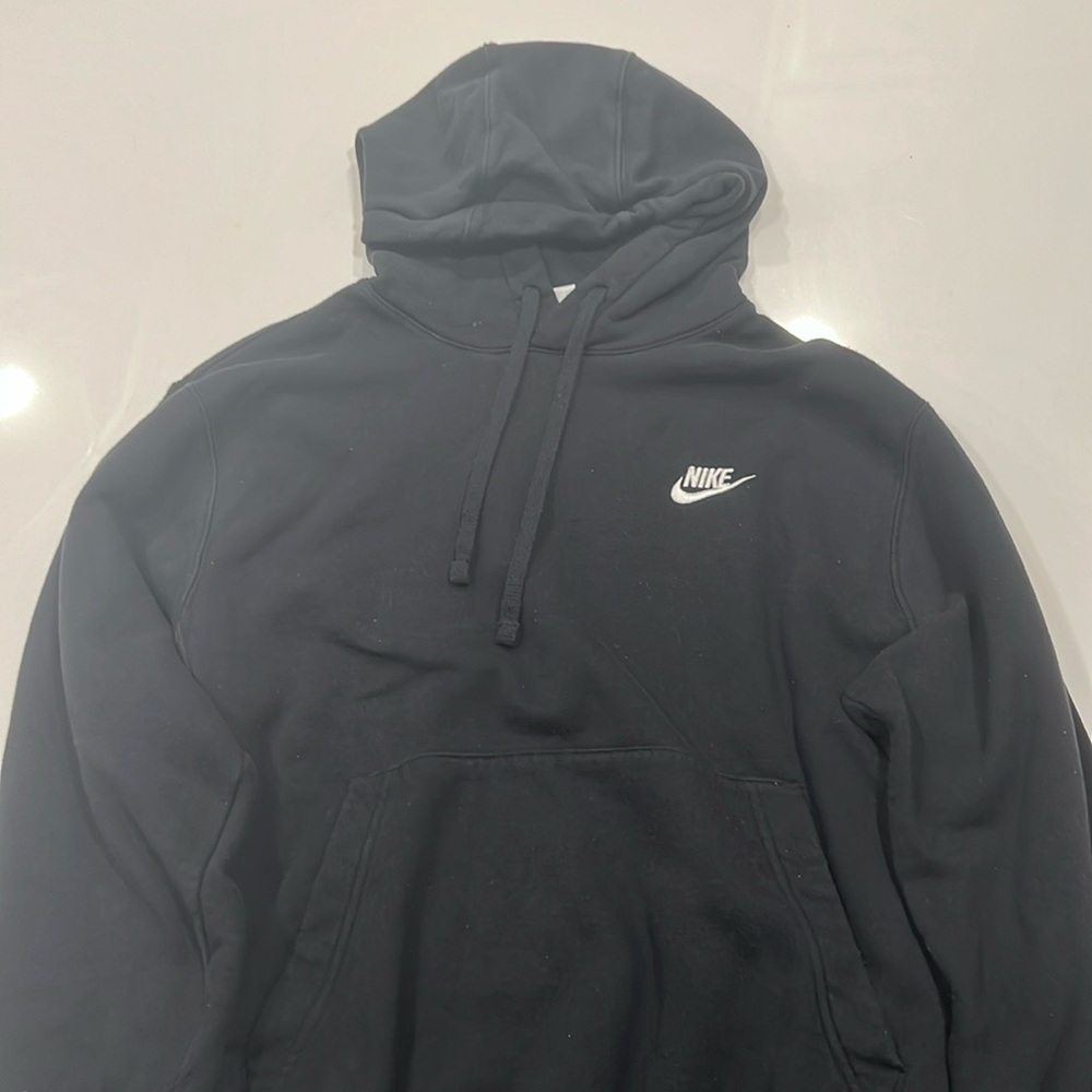 Black nike hoodie.